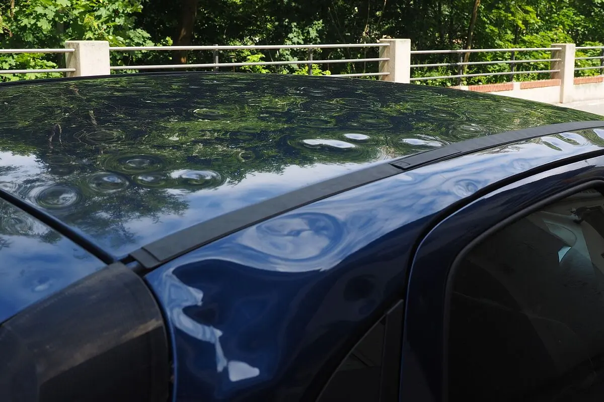 como sacar bollos de granizo con secador de pelo - Cómo quitar una abolladura de un auto